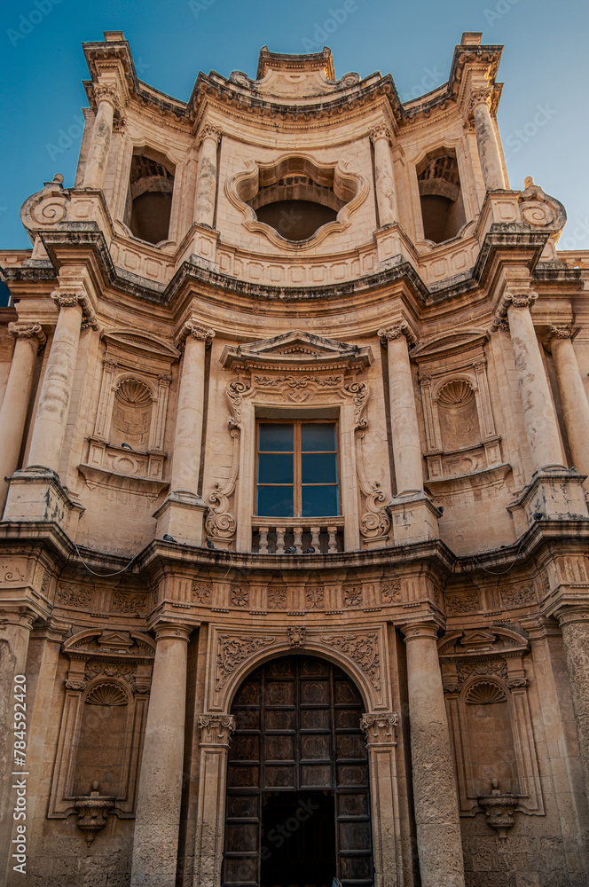The facade of the church of San Carlo in the main street of the baroque city of Noto, province of Syracuse, Sicily, Italy
