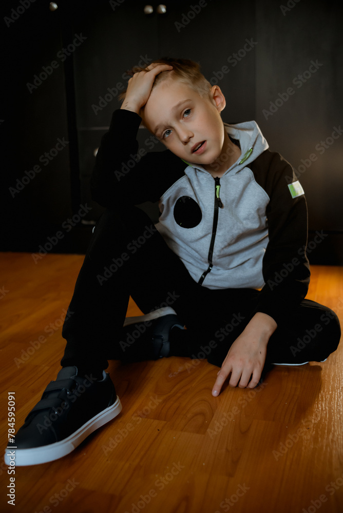little child sitting on the floor little child sitting on the floor