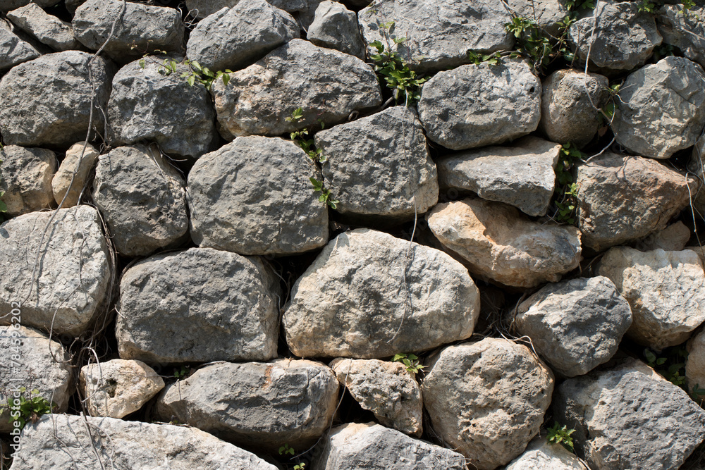 Texture of a black stone garden wall Texture of a black stone garden wall