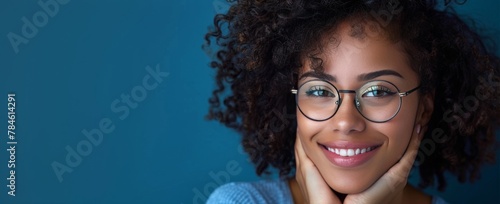 Woman Wearing Glasses and Smiling