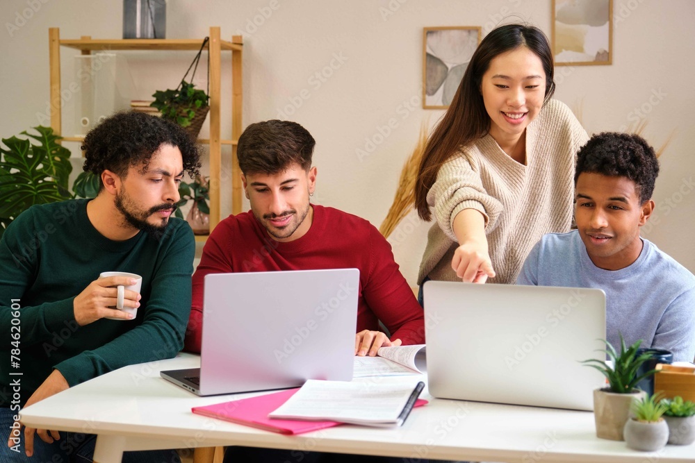 Asian female student explaining her colleagues the university lesson at shared flat. Asian female student explaining her colleagues the university lesson at shared flat.