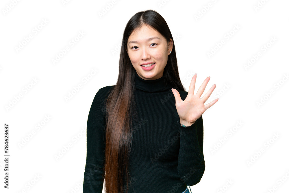 Young Asian woman over isolated chroma key background counting five with fingers Young Asian woman over isolated chroma key background counting five with fingers