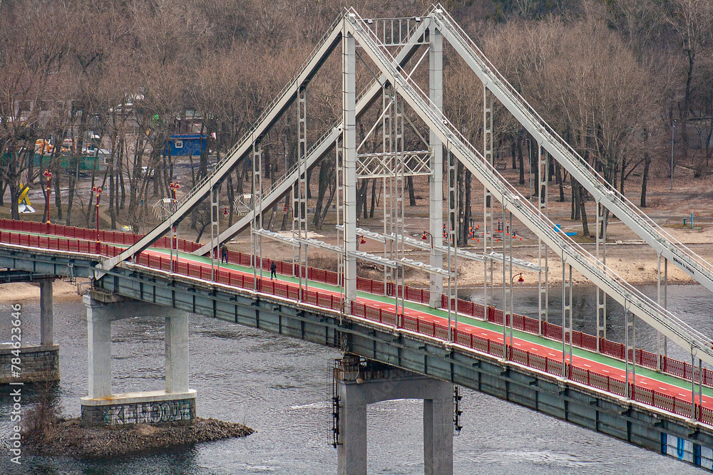 Fototapeta premium February 10, 2022, Ukraine, city of Kyiv, pedestrian bridge over the Dnieper River.