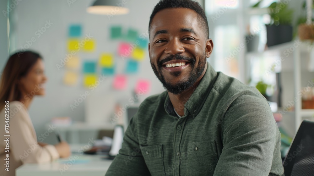 Smiling Professional in Office Setting Smiling Professional in Office Setting