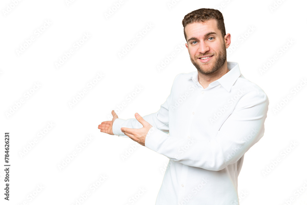 Young handsome blonde man over isolated chroma key background extending hands to the side for inviting to come Young handsome blonde man over isolated chroma key background extending hands to the side for inviting to come