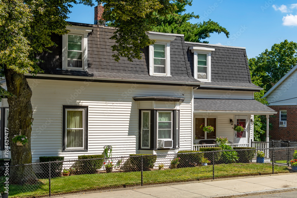 Classic design single-family home facade on a sunny summer day in Brighton, Massachusetts, USA