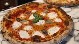 Delicious Traditional Italian Margherita Pizza with Fresh Basil