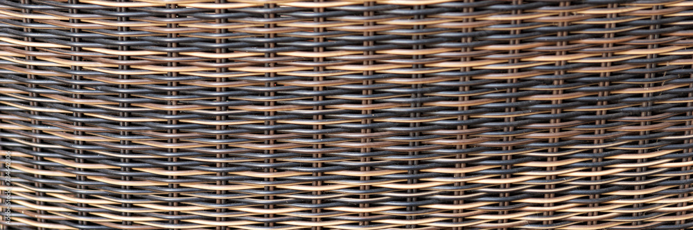 Panoramic image. Brown and black wicker of furniture for background Panoramic image. Brown and black wicker of furniture for background