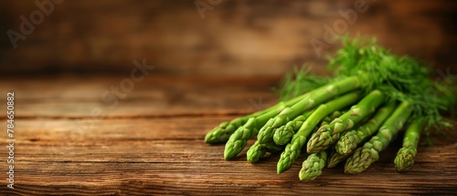 Green asparagus on an abstract background.