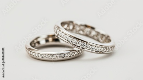 Bridal wedding rings, gold rings blurred white background