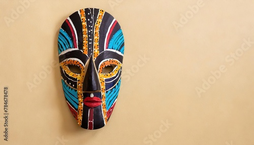  colorful ethnic African mask on simple background 