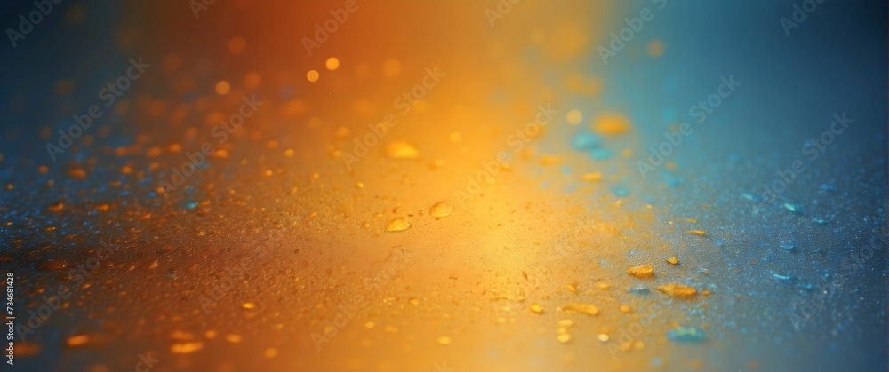 This image captures the beauty of water drops on a surface with contrasting warm and cool tones creating a visually appealing abstract image