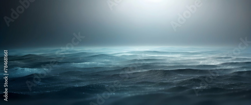 The realistic portrayal of a tumultuous ocean under the glow of moonlight with fog and mist enhances the feeling of awe photo