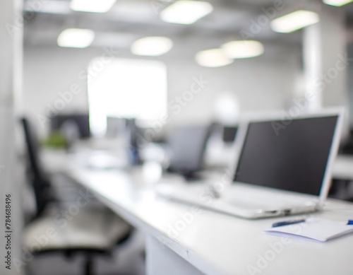 Blurred empty open space room. Abstract light bokeh at office interior background for design. (ID: 784688496)