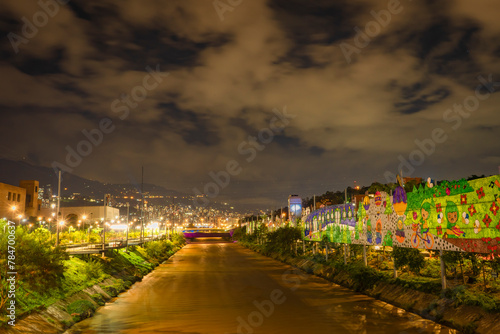 Medellin, Antioquia, Colombia. November 4, 2022. The Medellín or Aburrá river is a Colombian river that crosses the city of Medellín and its metropolitan area at night