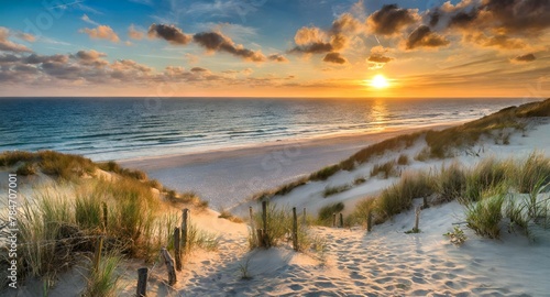 sunset over the beach . Sunset at the dune beach
