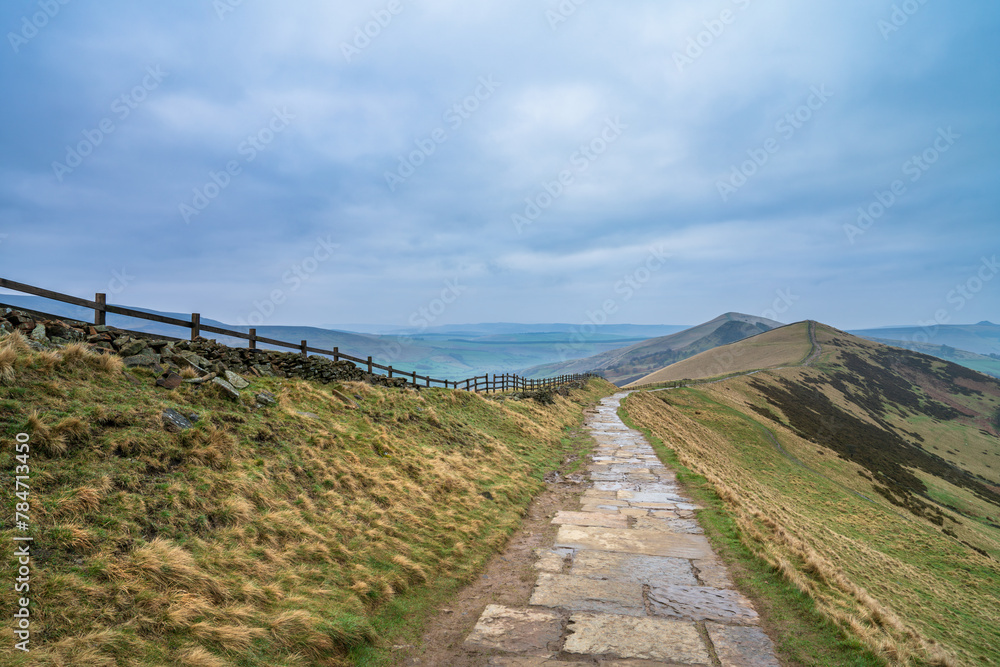 Stone footpath on the The Great Ridge hill in the English Peak District Stone footpath on the The Great Ridge hill in the English Peak District