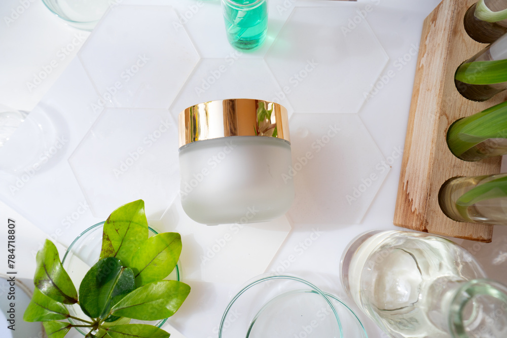 Fototapeta premium Laboratory tested face cream in white glass container,