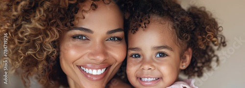 Woman Holding Little Girl