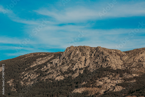 Rugged Mountain Peak Under a Clear Blue Sky