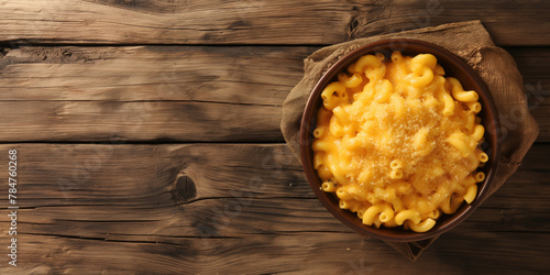 a bowl of macaroni and cheese on a wooden table. Copy space. Generative AI. Copy space. Generative AI