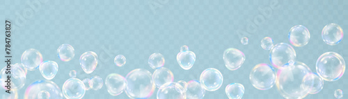 Realistic colorful soap bubbles with rainbow reflections and highlights. Vector illustration.