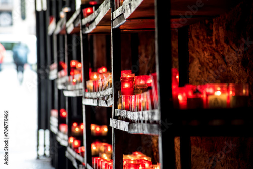 Offering candles in a Catholic church photo