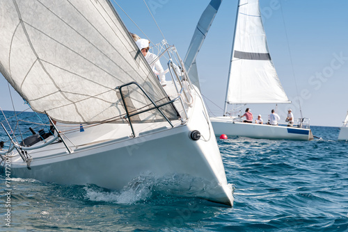 Close-up of sailing yachts racing in the mediterranean sea © kirill_makarov