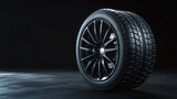 Car tire isolated on black background Modern high