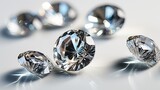Close up of diamond stones of different cuts and sizes on light background with shadows