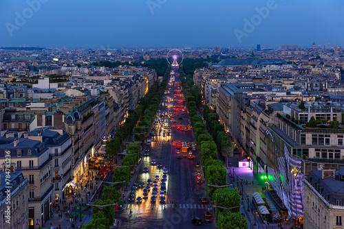 Aerial view of Avenue des Champs-Elysees in Paris, France. Night skyline of Paris. Architecture and landmarks of Paris