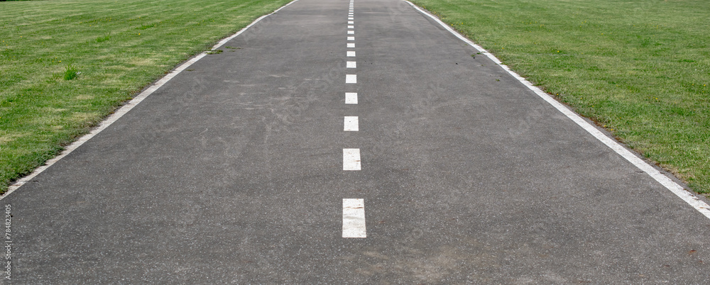empty airport runway, asphalt with white lines