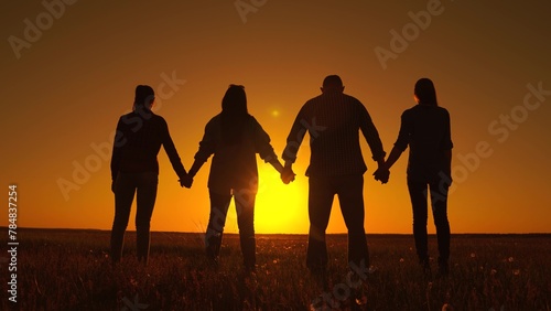 Business people, partners, trust concept, Teamwork of people raising their hands to sky, family business team concept. Group of people holding hands raise their hands to sky, prayer of man of woman.