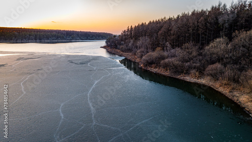 The landscape of Jingyuetan National Forest Park in Changchun  China  where ice melts and snow melts in early spring