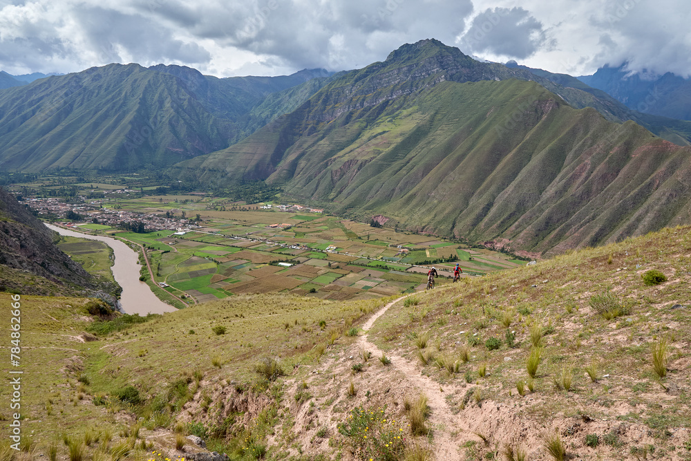 Fototapeta premium The Sacred Valley of Peru is not only a treasure trove of historical and cultural wonders but also a paradise for outdoor enthusiasts, including mountain bikers.