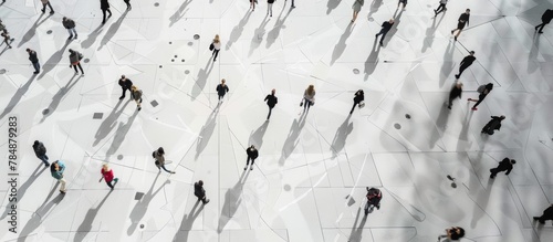 Overhead View of People Walking on Patterned Ground.