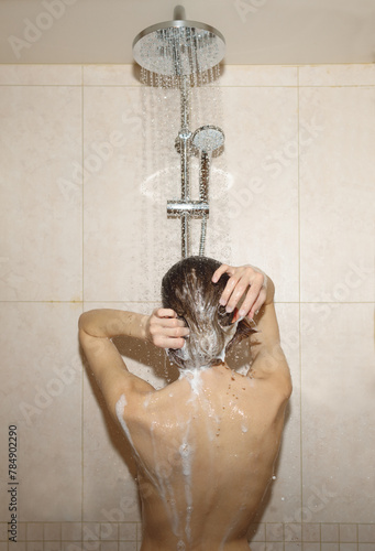 naked woman while taking shower at home