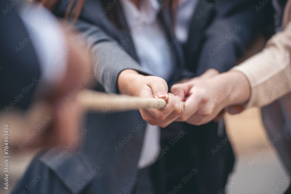 Tug of war Group of business people Hands pulling rope symbol team unified teamwork Partnership Concept. Businesswoman Team holding hands together partnership leader teamwork. diversity competition