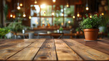 Wooden Table in Vibrant Restaurant Interior Adorned with a Flourishing Green Plant