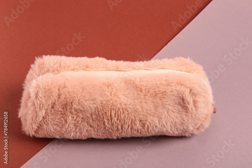 Pencil case on colorful background