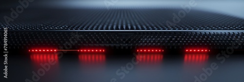 Front view on a black carbon style surface, aspect ratio 3:1