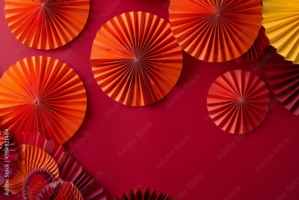 Paper origami fan on red background,  Minimal creative concept