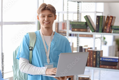 Male medical intern with la...