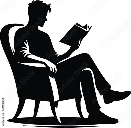 silhouette of a person reading