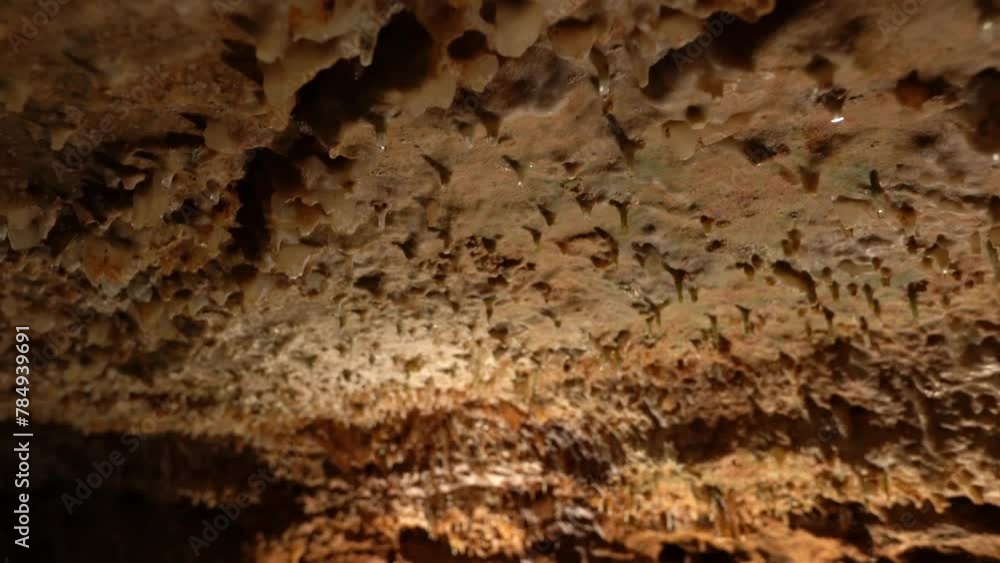 Cave limestone stalagmite stalactite close up underground. Dripping cavern formations. Cave limestone stalagmite stalactite close up underground. Dripping cavern formations.