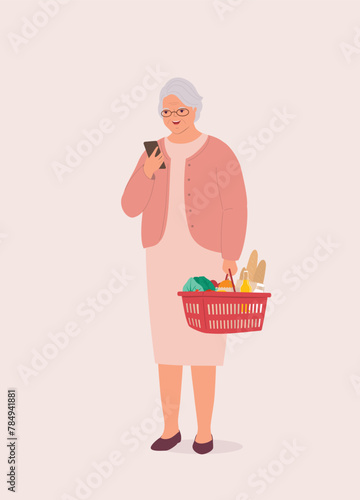 One Smiling Elderly Woman With Groceries Using Her Mobile Phone. Full Length.