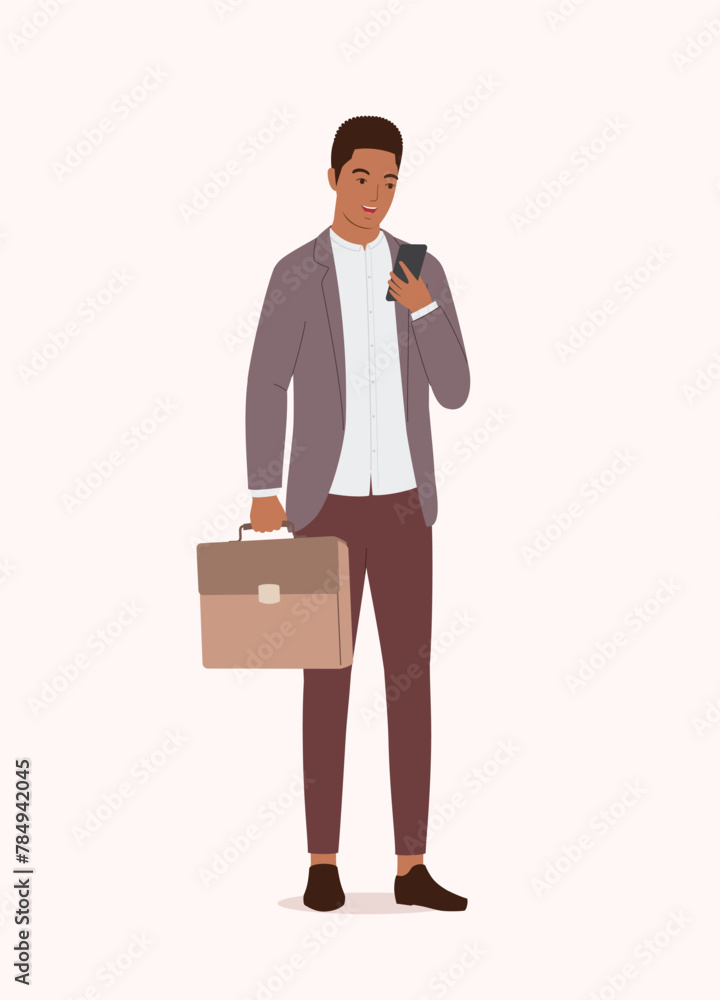 One Smiling Black Businessman With Briefcase Using His Mobile Phone While Standing. One Smiling Black Businessman With Briefcase Using His Mobile Phone While Standing.