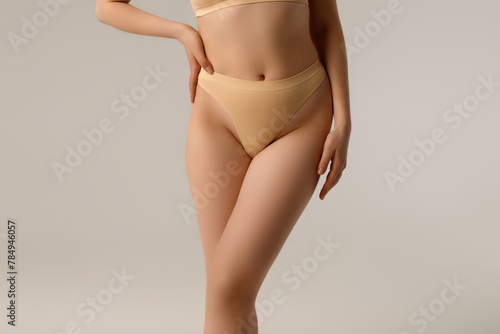 Fit and healthy. Beautiful female body on white background. Beauty, cosmetics, spa, depilation, diet and treatment, fitness concept. Fit and sportive, sensual body with well-kept skin in underwear.