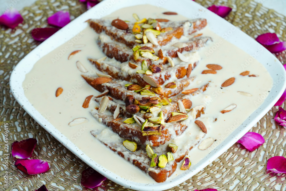 Shahi tukda or shahi tukra, bread pudding, sweet made with bread Shahi tukda or shahi tukra, bread pudding, sweet made with bread