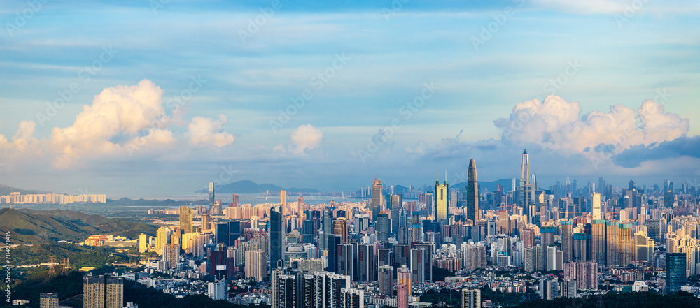 Panoramic view of city skyline and modern buildings in Shenzhen at sunrise. Famous city landmarks in China. Panoramic view.